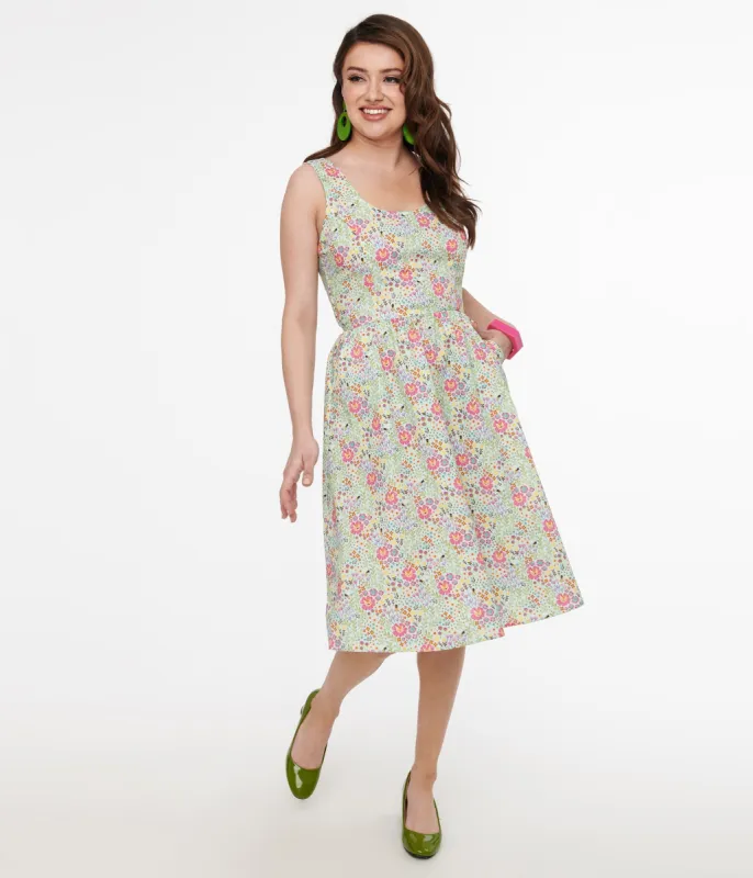 Retrolicious 1950s Green Floral Cat Print Fit & Flare Dress sold by Unique Vintage