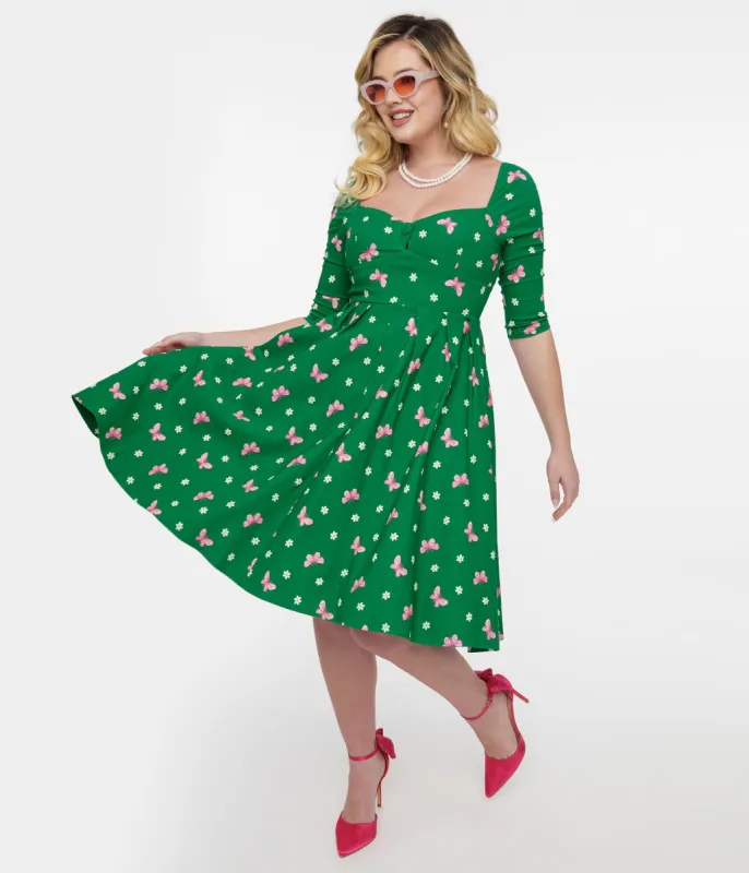 Unique Vintage 1950s Green & Butterfly Stamp Print Lamar Swing Dress sold by Unique Vintage