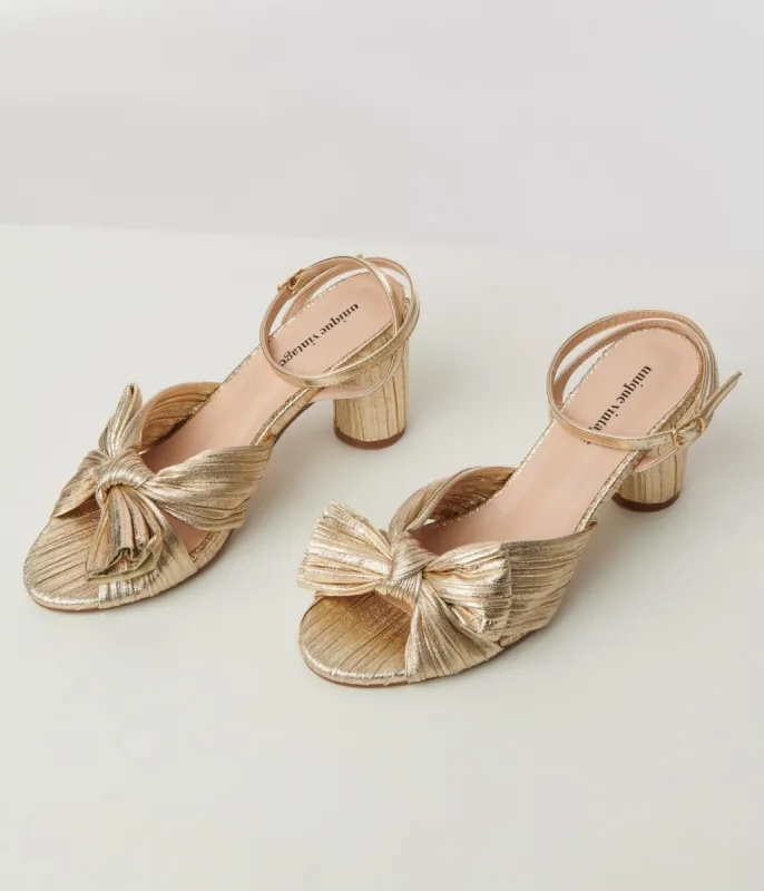 Unique Vintage Golden Slingback Bow Heel sold by Unique Vintage