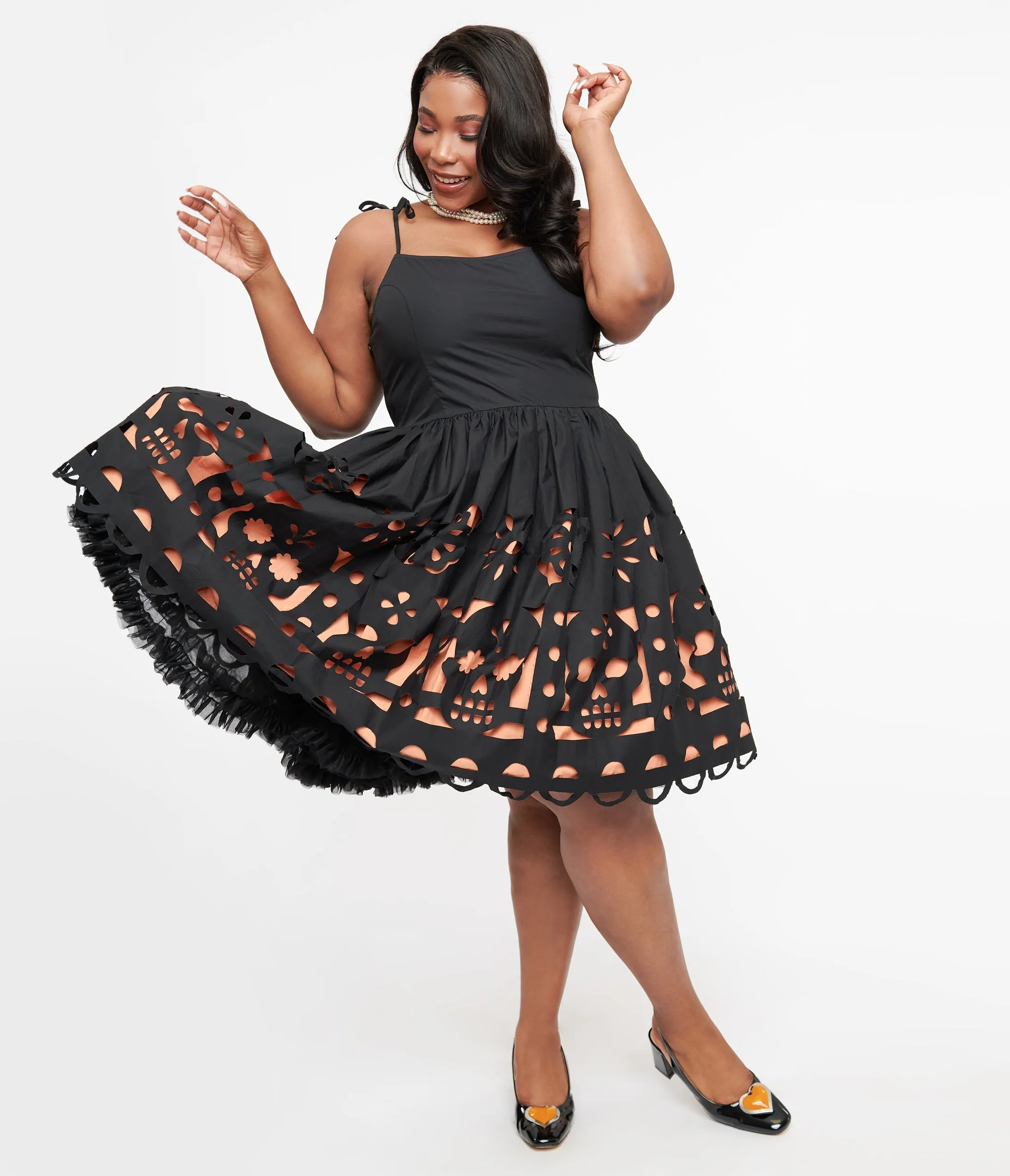 Unique Vintage Plus Size 1950s Black & Orange Dia De Los Muertos Cutout Bobbie Swing Dress sold by Unique Vintage