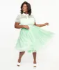 Unique Vintage Plus Size 1950s Green & White Daisy Print Hollie Swing Dress sold by Unique Vintage