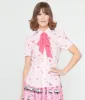 Barbie x Unique Vintage 1970s Pink Barbie Floral Print Bow Blouse sold by Unique Vintage