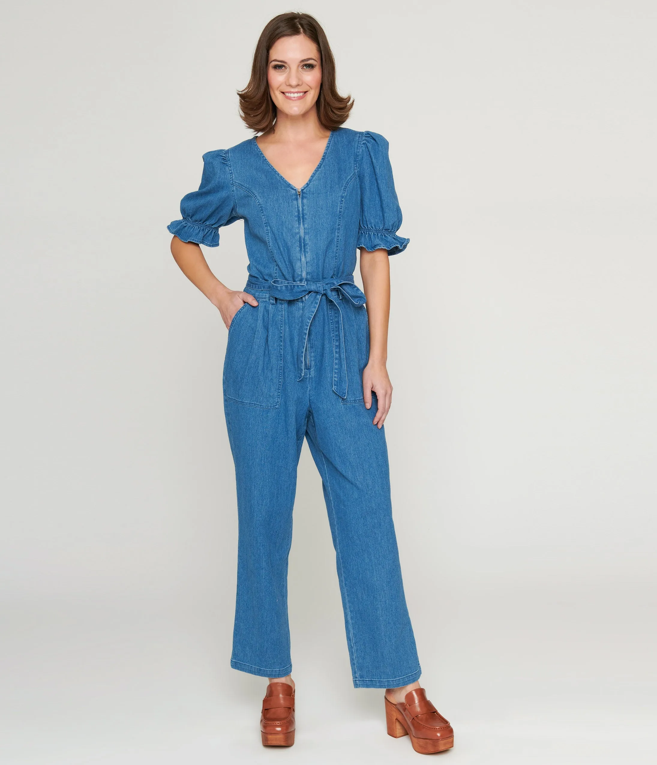 1970s Denim Puff Sleeve Jumpsuit sold by Unique Vintage
