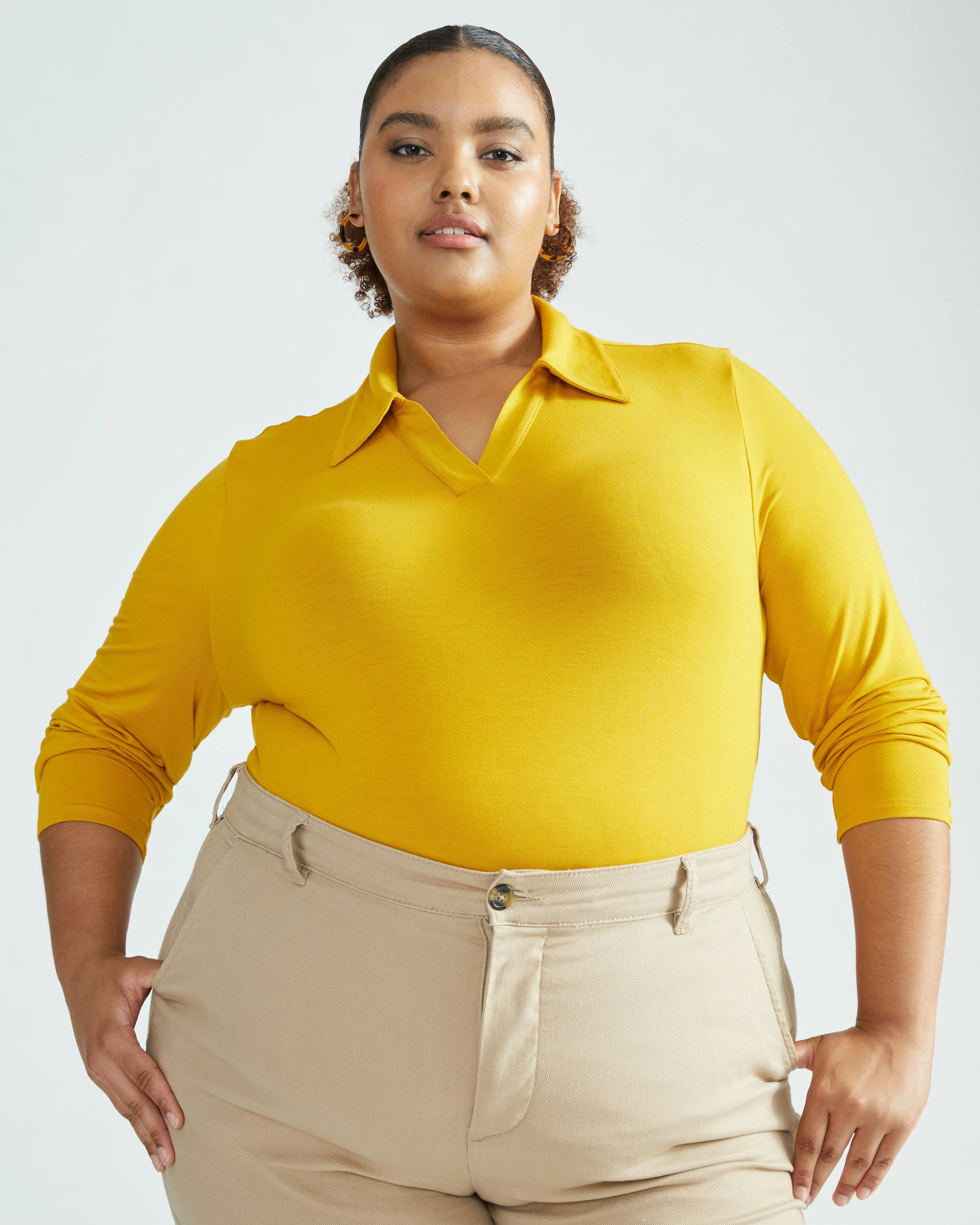 Aalto Liquid Jersey Polo Top - Brass sold by Universal Standard