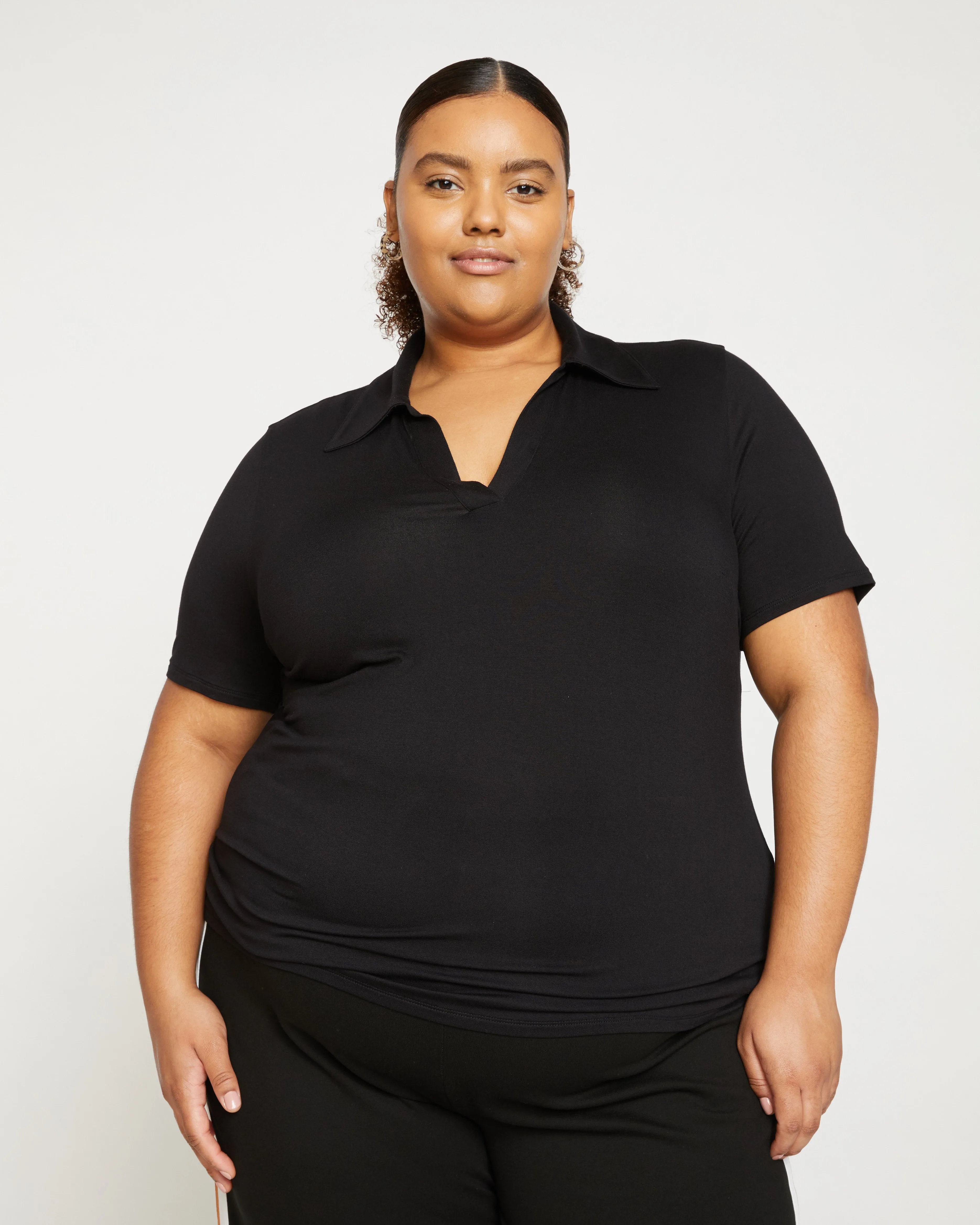 Apero Liquid Jersey Polo Top - Black sold by Universal Standard