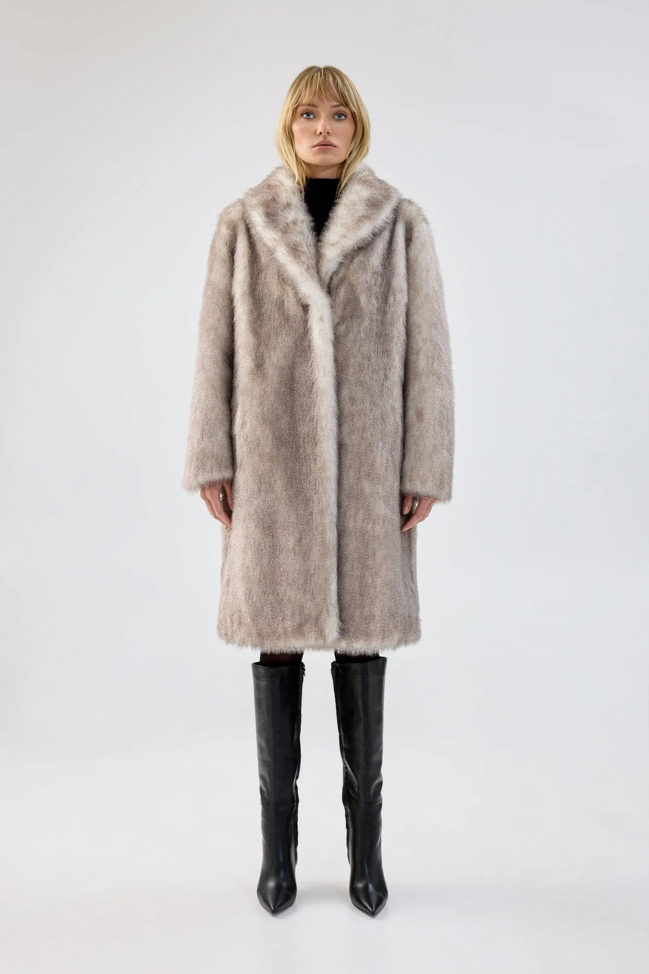 Elixir Coat sold by Unreal Fur