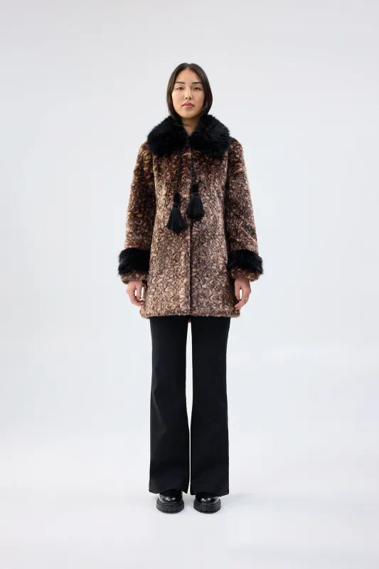Planet Earth Coat sold by Unreal Fur