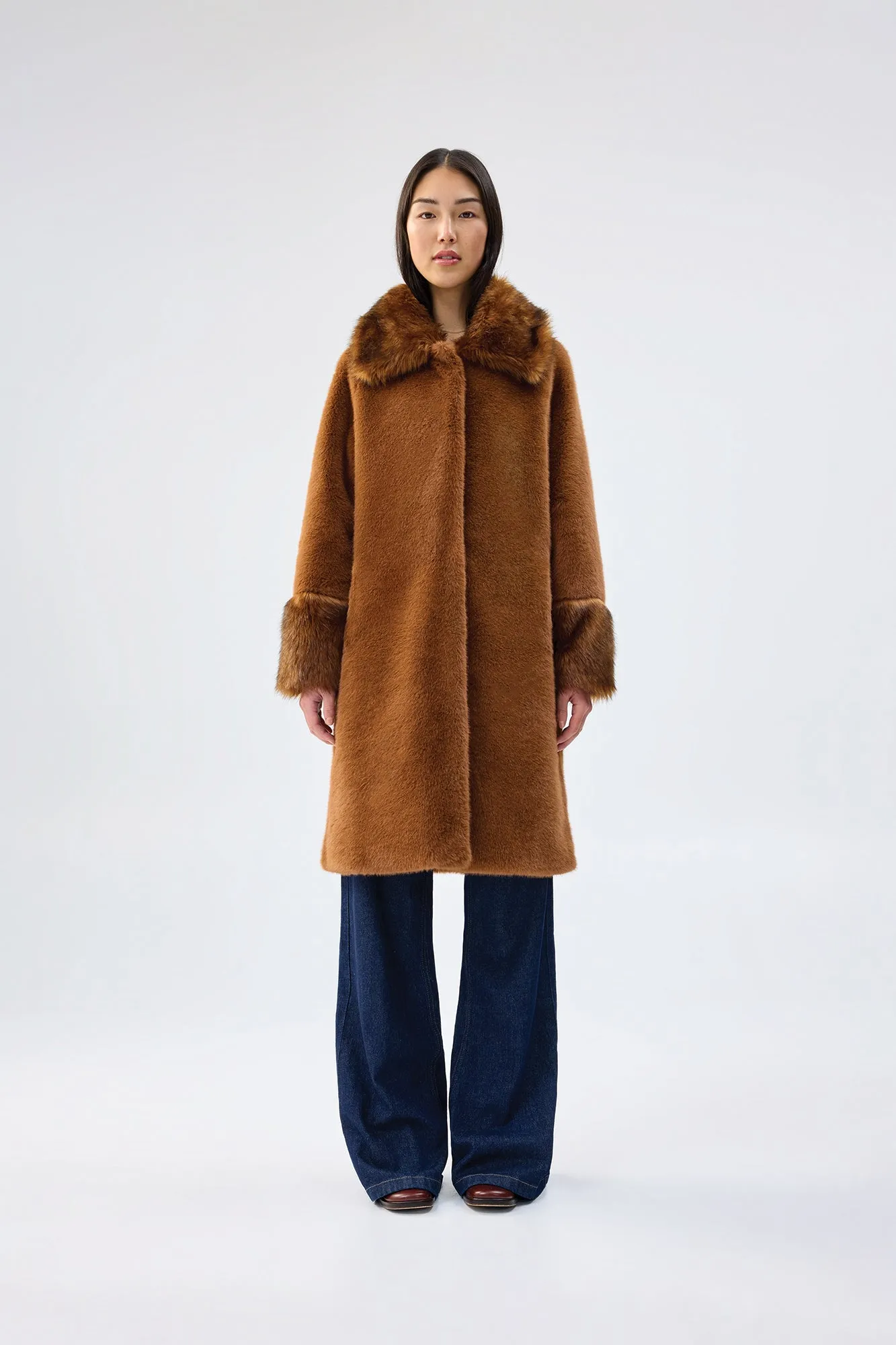 Timeless Coat sold by Unreal Fur