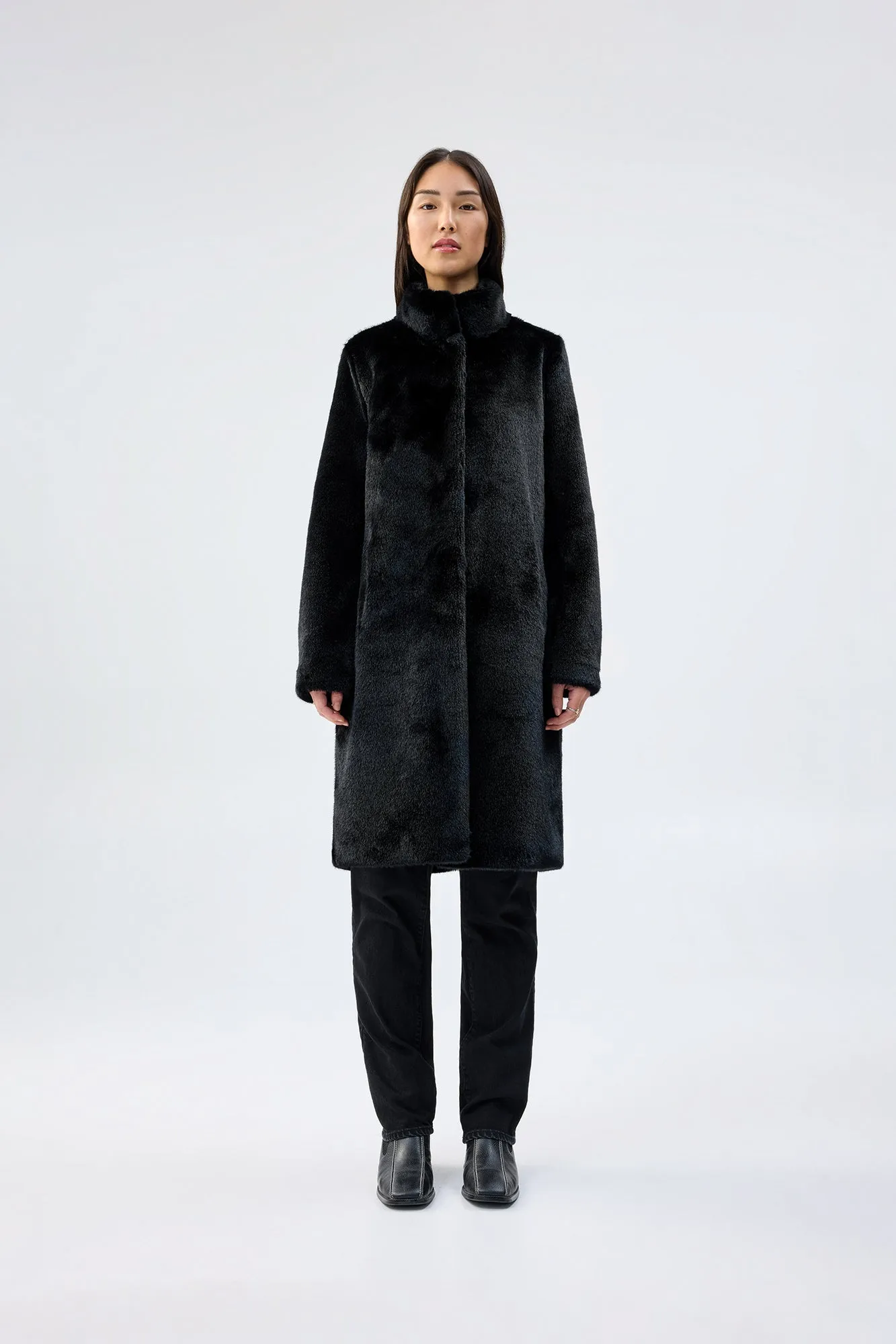 Raven Coat sold by Unreal Fur
