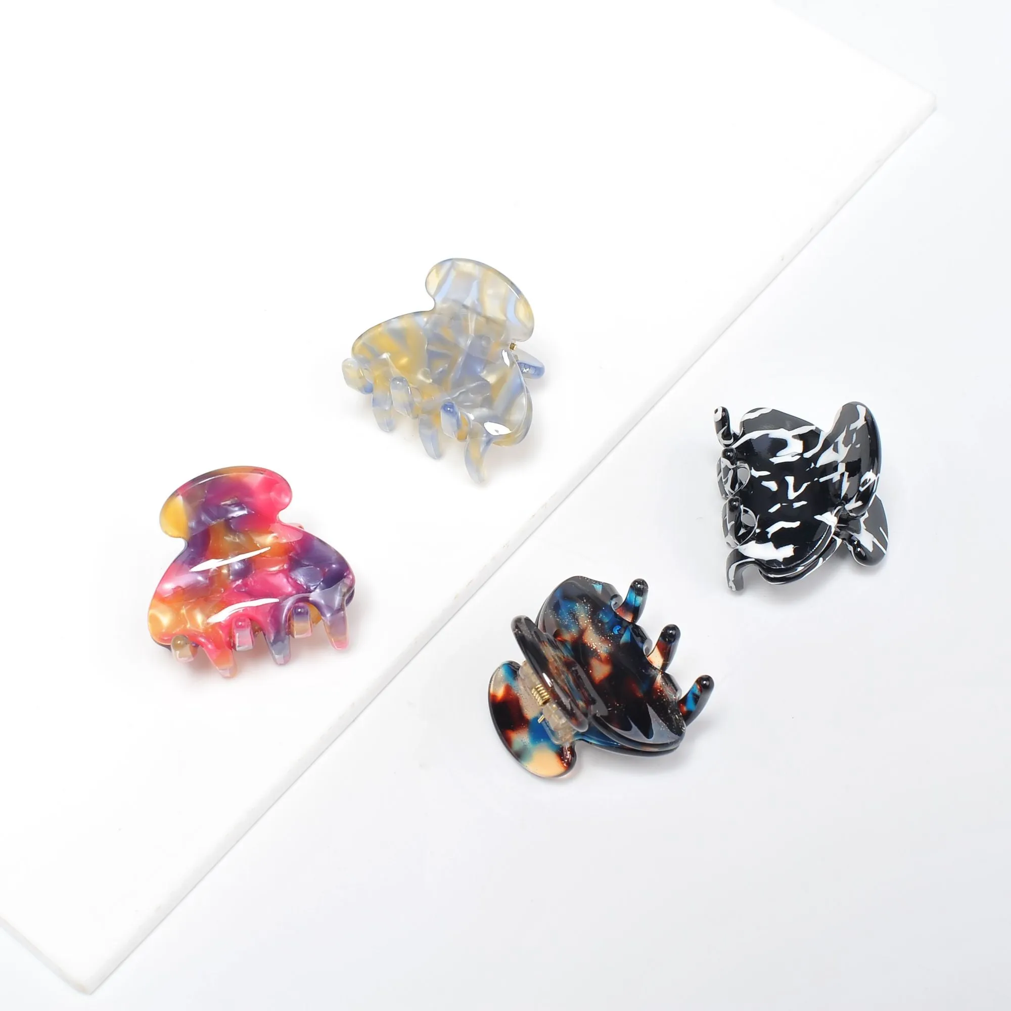 Mini Hair Claw - Assorted 4 Pack Hair Claw sold by Urban Expressions
