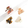 Assorted Mini Hair Claw - 4 Pack Hair Claw sold by Urban Expressions