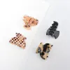 Assorted Mini Hair Claw - 4 Pack Hair Claw sold by Urban Expressions