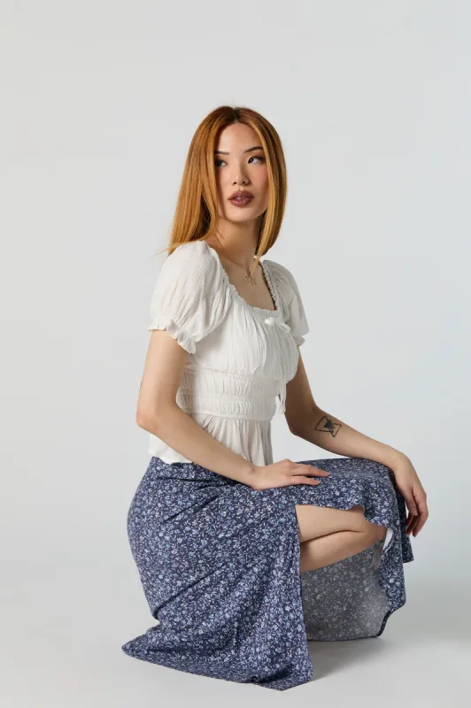 Jupe midi fleurie bleue avec fente sold by Urban Planet
