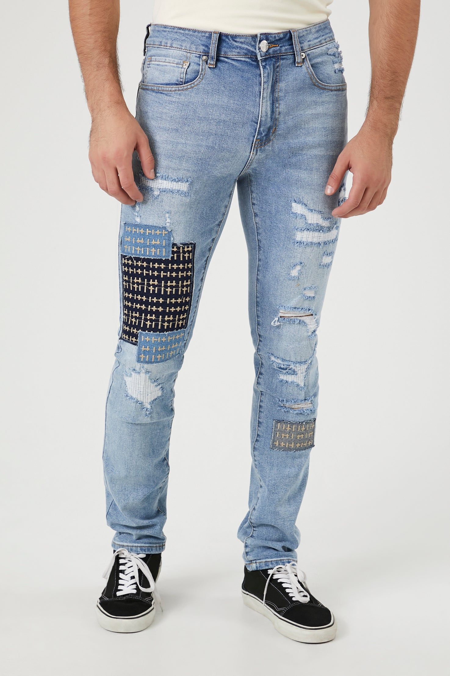 Distressed Patch Work Skinny Jean sold by Urban Planet