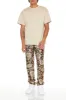 Pantalon mince en jacquard fleuri sold by Urban Planet
