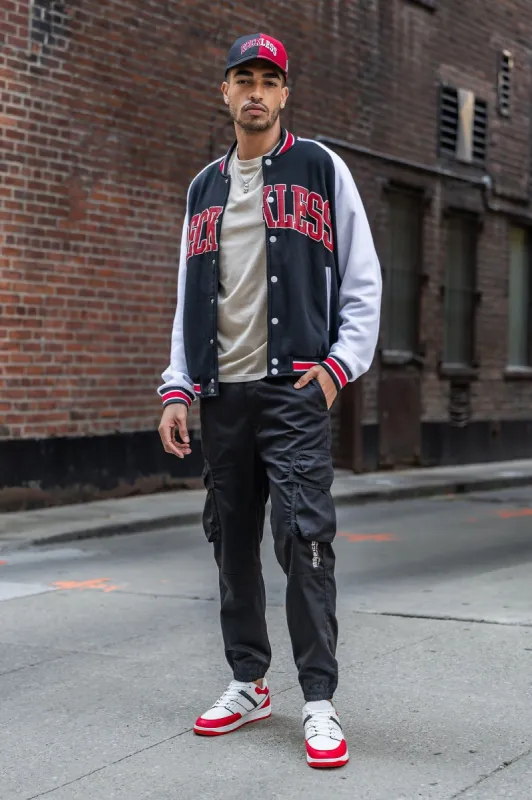 Reckless Embroidered Varsity Jacket sold by Urban Planet