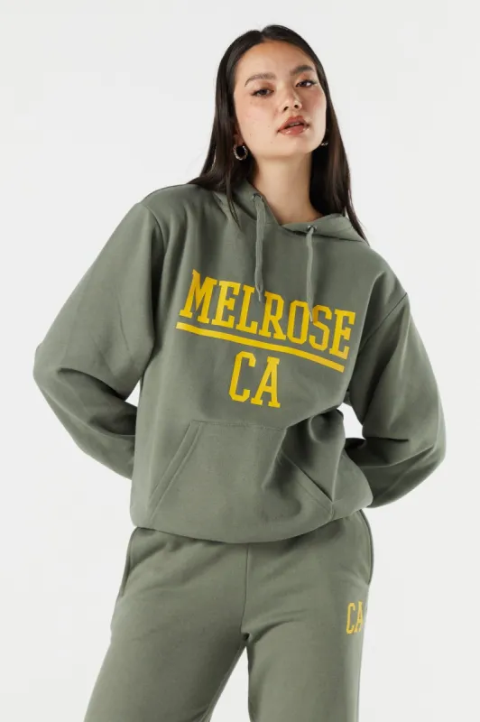 Haut surdiensionné à capuchon en molleton avec imprimé Melrose sold by Urban Planet