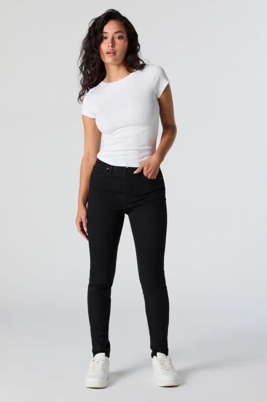 Jean ajusté délavé noir à taille haute sold by Urban Planet