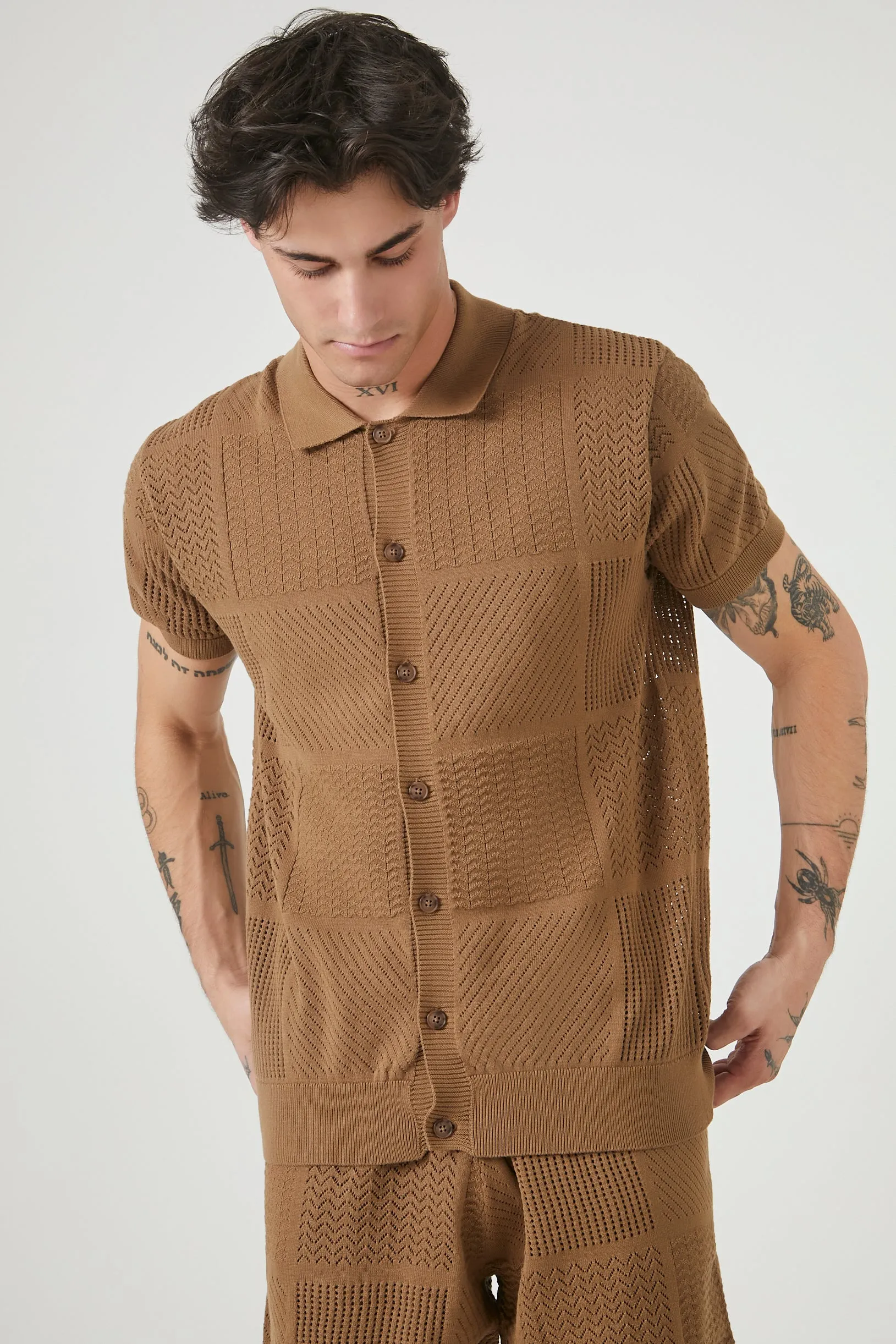 Haut boutonné en tricot de pointelle sold by Urban Planet