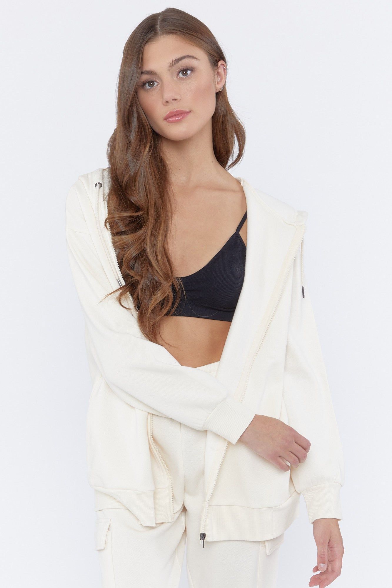 Haut surdimensionné à capuchon et fermeture à glissière sold by Urban Planet