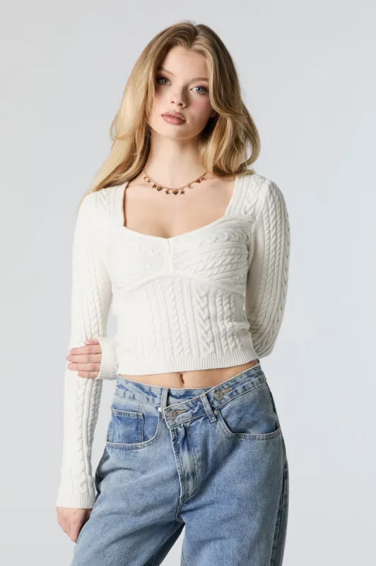 Chandail en tricot torsadé avec décolleté en coeur sold by Urban Planet