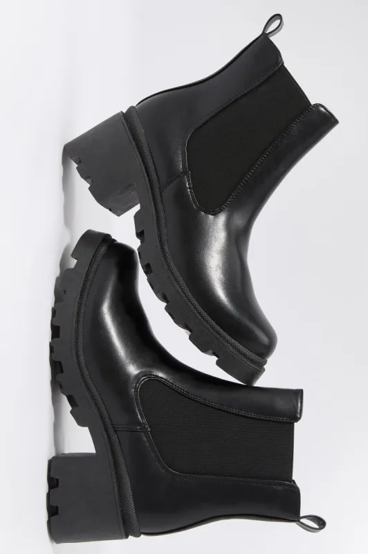Bottes à soufflets en similicuir avec talons sold by Urban Planet