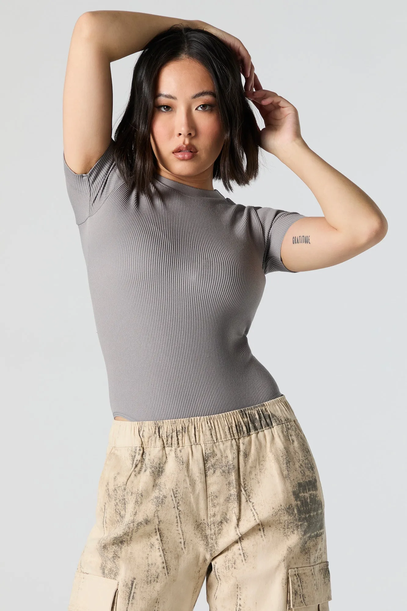 Seamless Ribbed Short Sleeve Bodysuit sold by Urban Planet