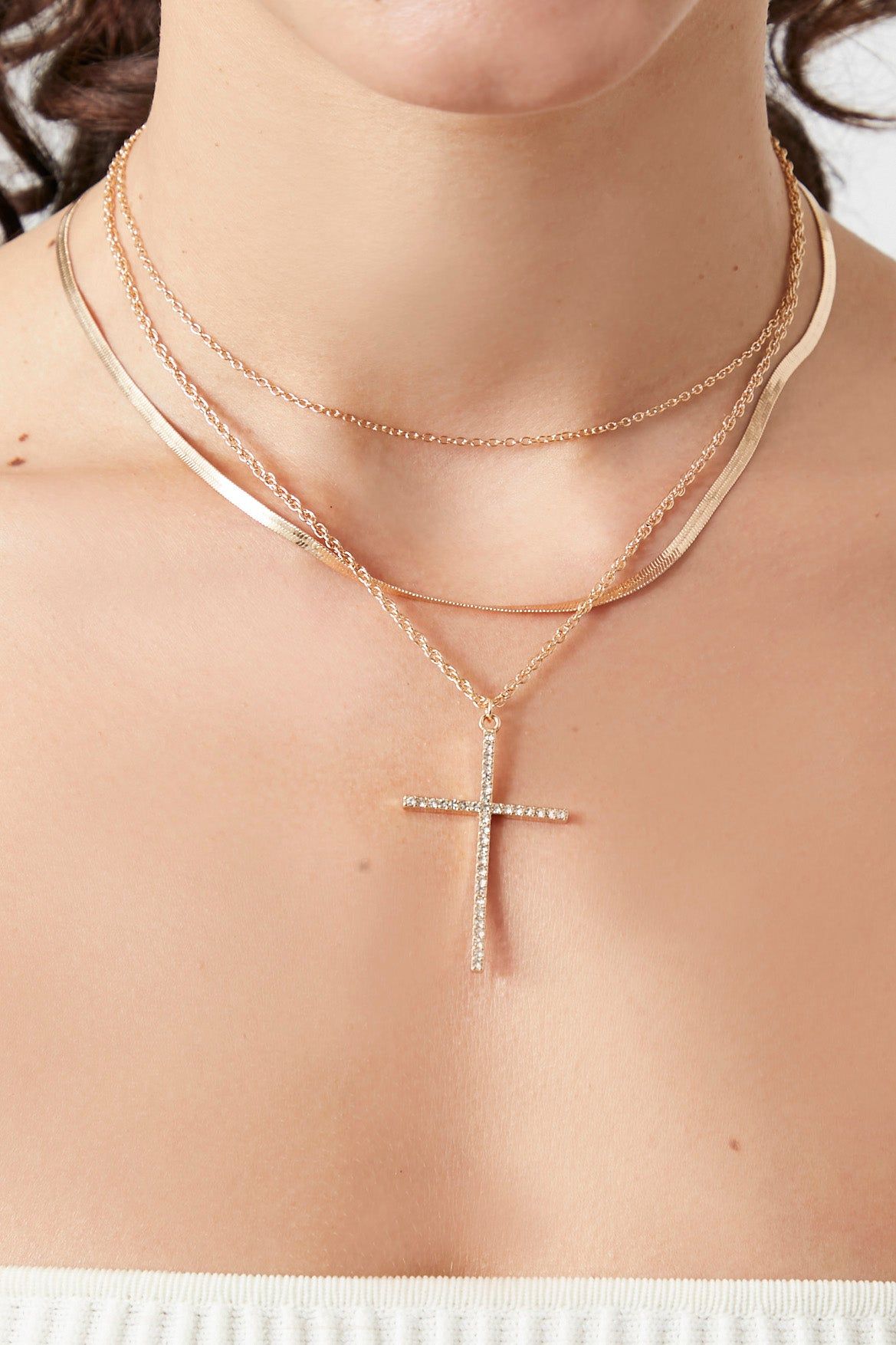 Layered Rhinestone Cross Necklace sold by Urban Planet