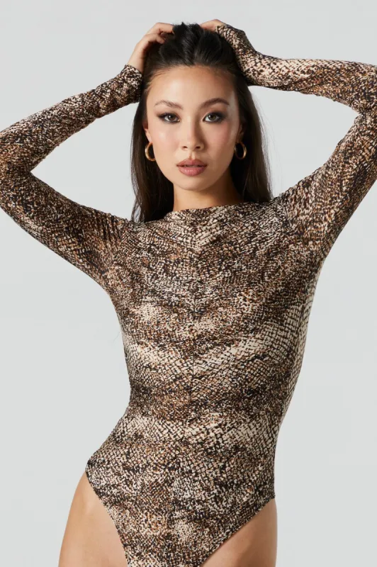 Contour Snakeskin Ruched Long Sleeve Bodysuit sold by Urban Planet