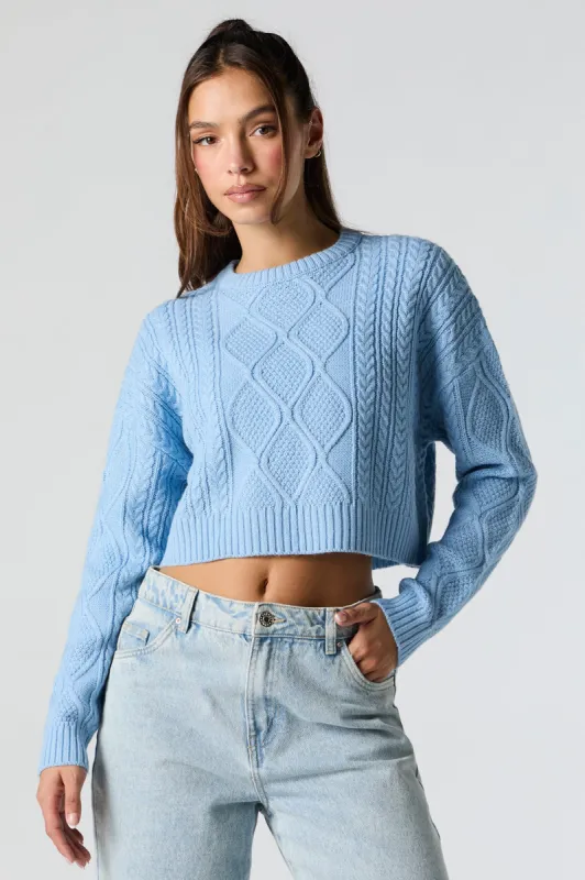 Chandail court en tricot torsadé sold by Urban Planet
