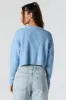 Chandail court en tricot torsadé sold by Urban Planet