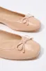 Ballerines en similicuir verni avec boucles sold by Urban Planet
