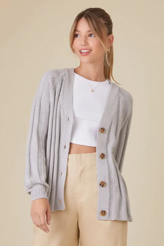 Cardigan en tricot boutonné sold by Urban Planet