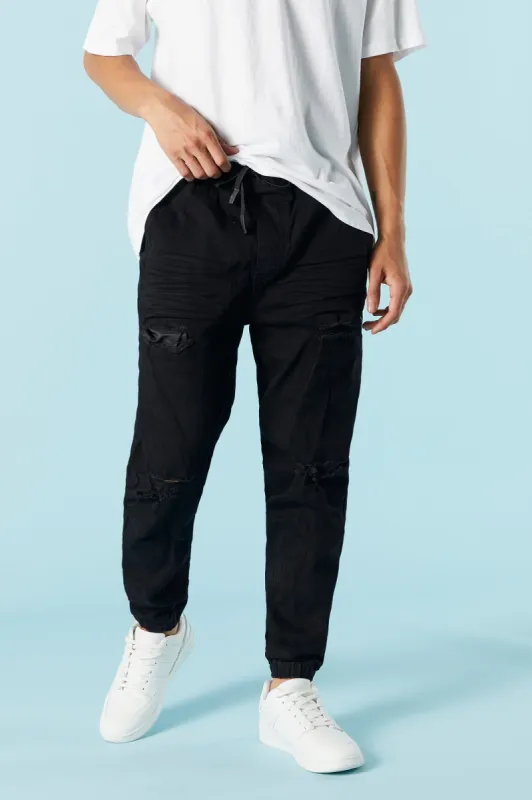 Black Wash Distressed Denim Jogger sold by Urban Planet