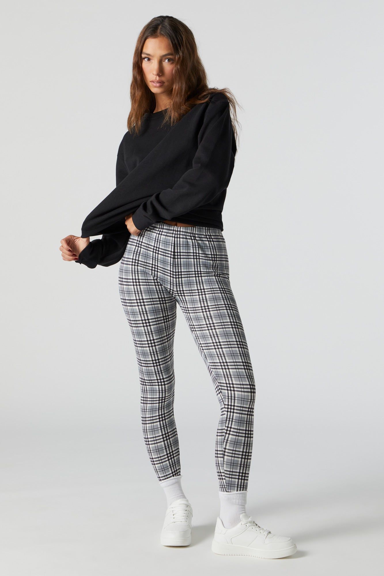 Legging doublé de similifourrure à motif à carreaux sold by Urban Planet