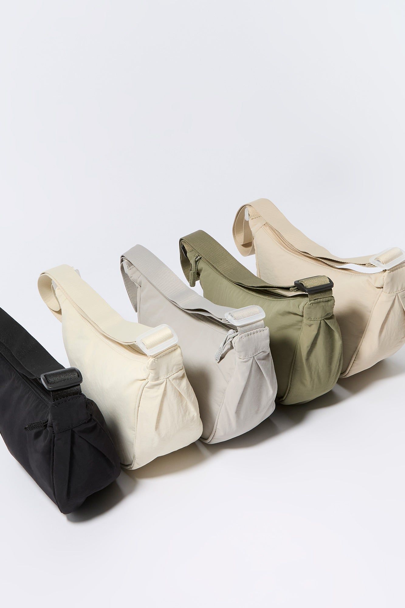 Nylon Half Moon Bag sold by Urban Planet