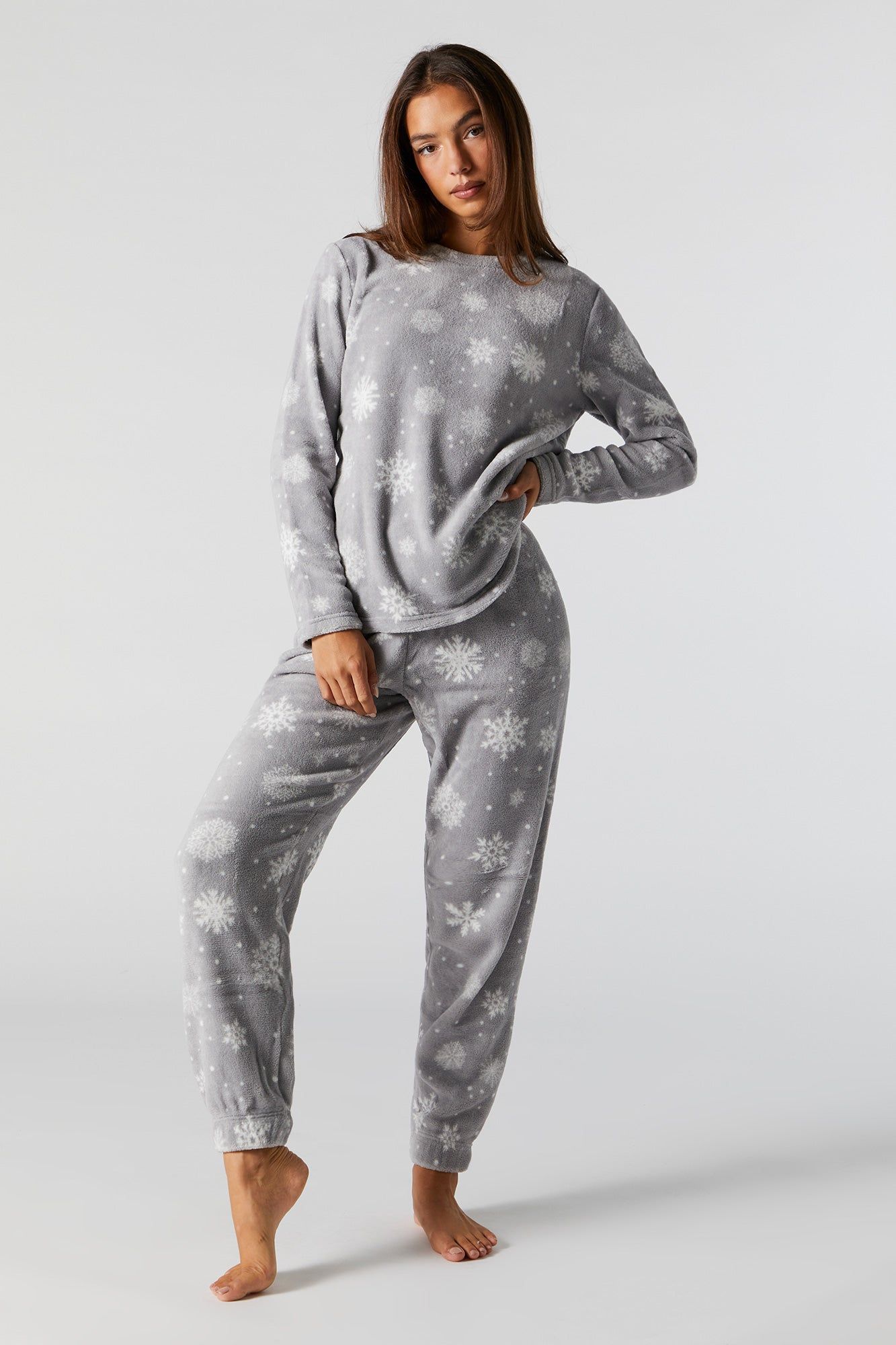 Snowflake 2 Piece Plush Pajama Set sold by Urban Planet