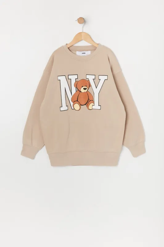 Girls NY Teddy Graphic Oversized Sweater sold by Urban Planet