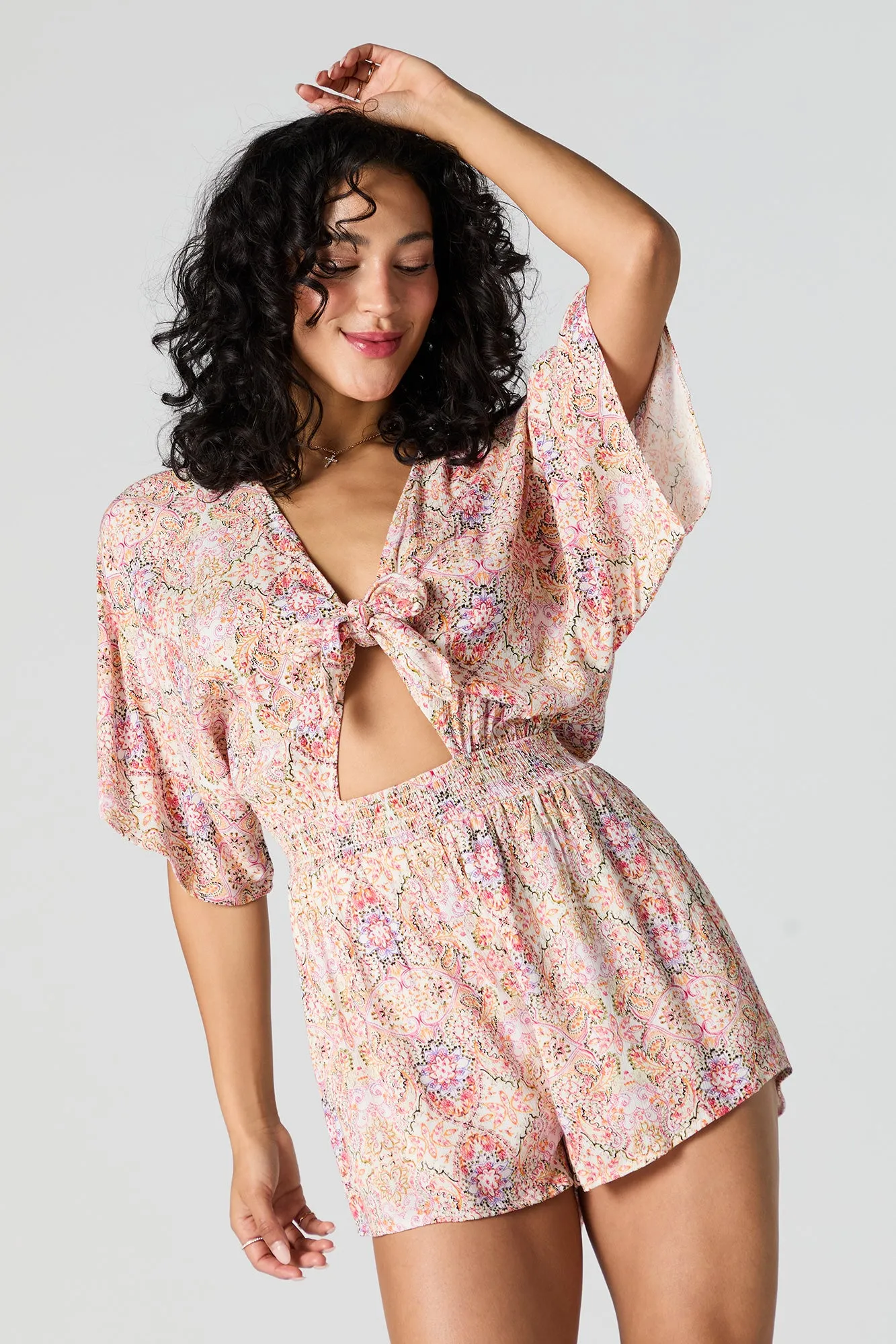 Paisley Print Front Tie Cut Out Romper sold by Urban Planet