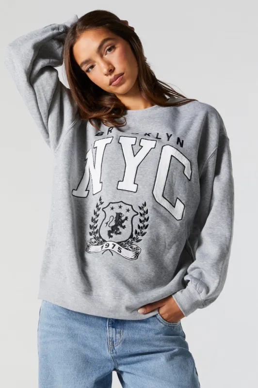 Chenille Embroidered NYC Fleece Sweatshirt sold by Urban Planet