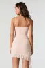Minirobe asymétrique volantée en filet sold by Urban Planet
