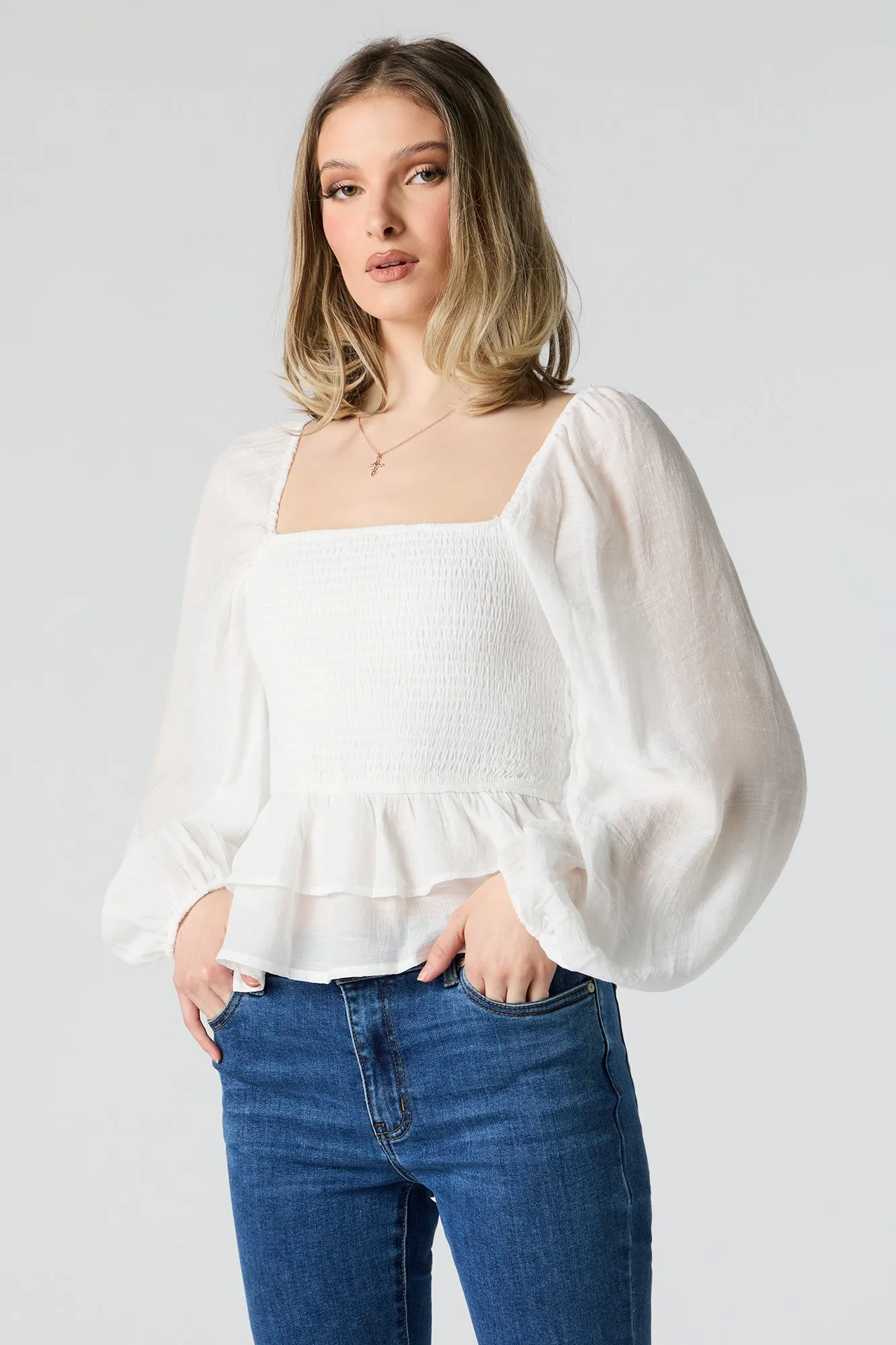 Smocked Tiered Long Sleeve Top sold by Urban Planet