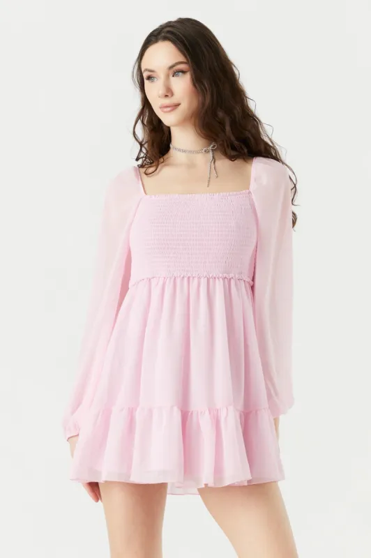 Minirobe smockée à manches longues sold by Urban Planet