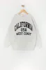 Girls Oversized Destination Chenille Embroidered Sweatshirt sold by Urban Planet