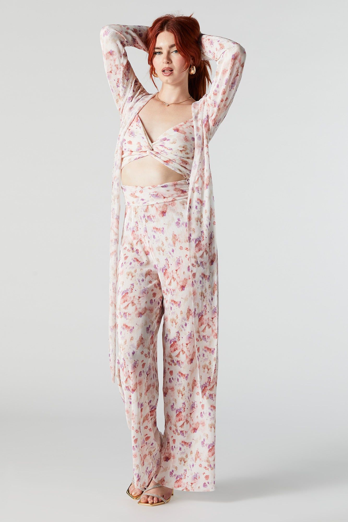 Pantalon à jambe large et taille haute fleuri sold by Urban Planet