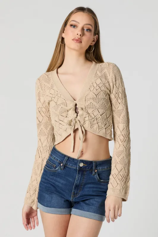 Crochet Front Tie Cropped Long Sleeve Top sold by Urban Planet