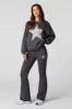 Pantalon à jambe évasée en molleton avec imprimé sold by Urban Planet