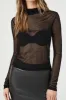 Haut en tricot diaphane à manches longues et col montant sold by Urban Planet
