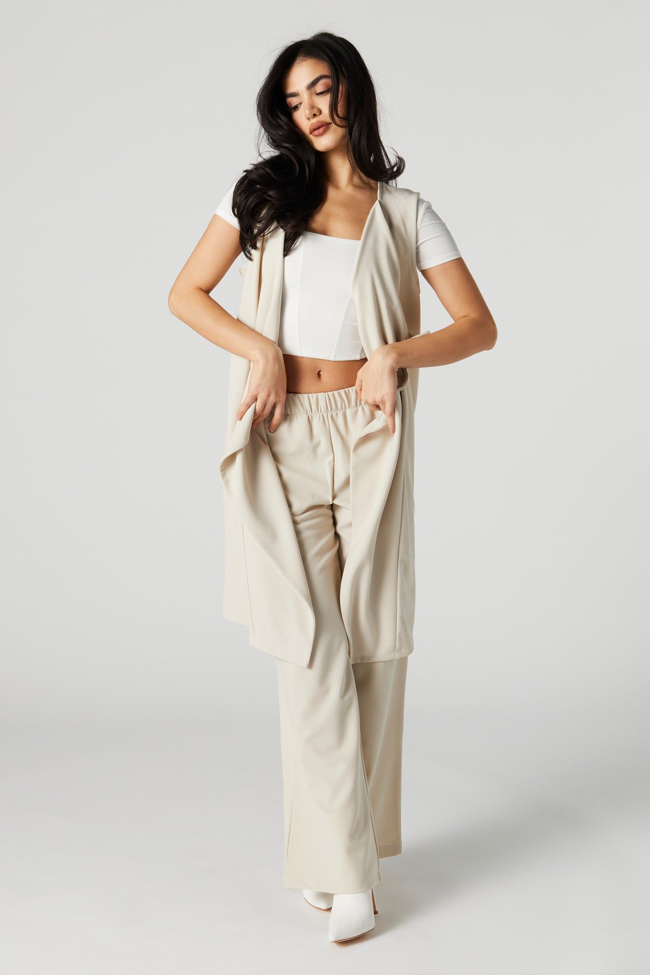 Veste asymétrique en crêpe sold by Urban Planet