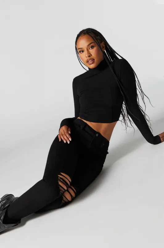 Jean remonte-fesses ajusté d'aspect usé délavé noir sold by Urban Planet